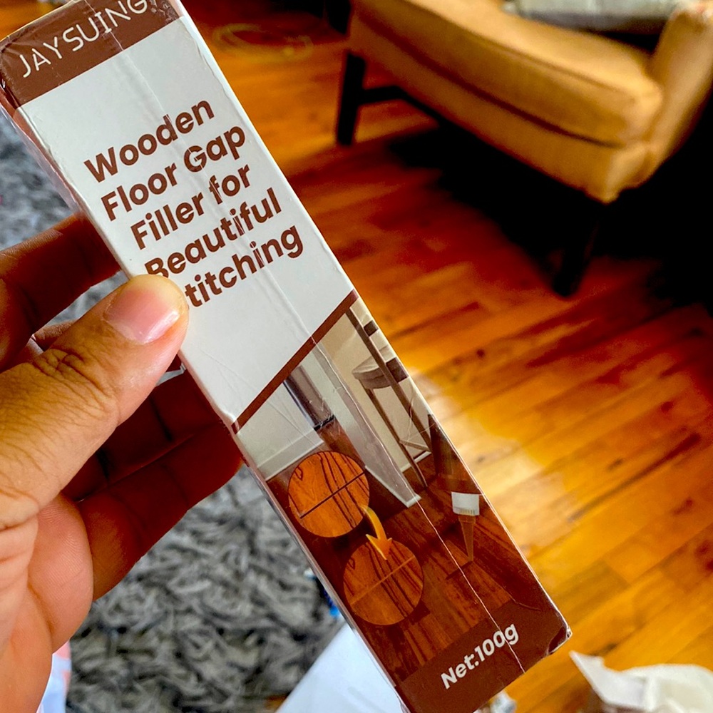 Hard wood floor gap filler
